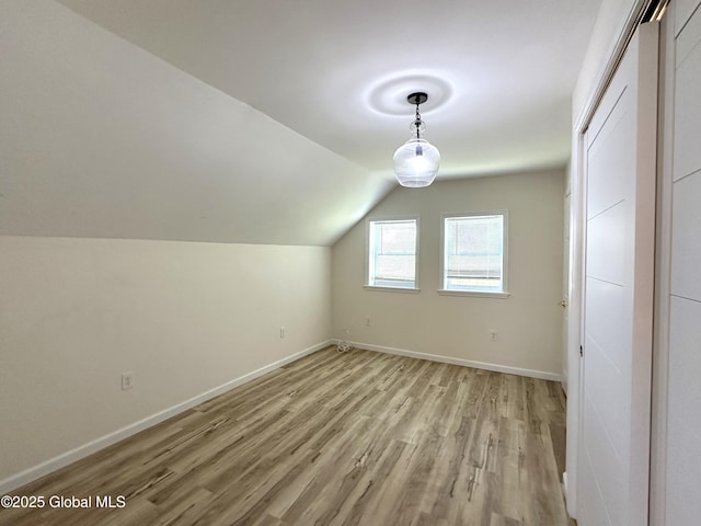 111 Rose St, Delanson, NY 12053 - additional living space featuring light wood-style flooring, baseboards, and lofted ceiling
