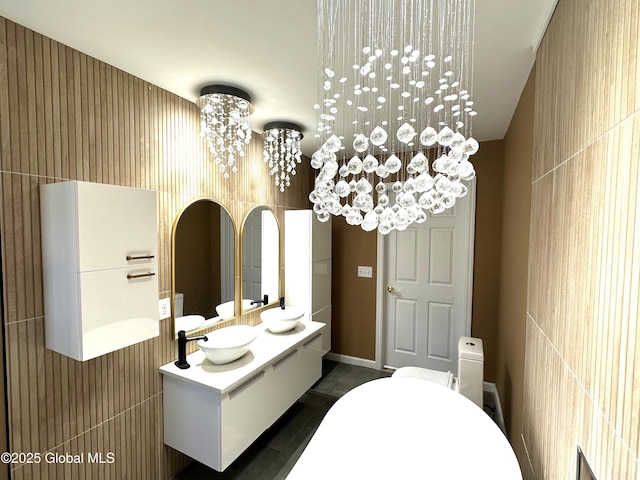 111 Rose St, Delanson, NY 12053 - bathroom featuring toilet, a chandelier, tile patterned floors, and vanity
