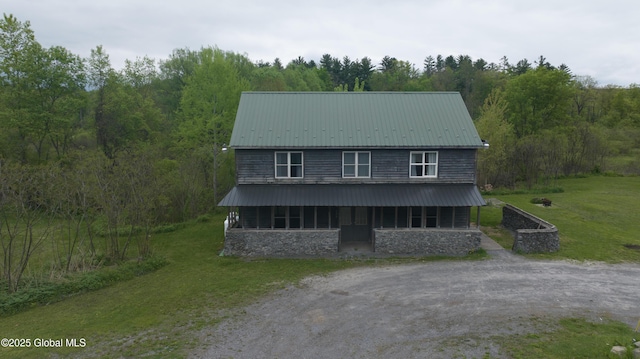 177 County Highway 155, Mayfield, NY 12025 - view of front of home featuring covered porch, a front lawn, driveway, and metal roof