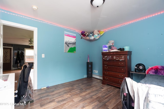 177 County Highway 155, Mayfield, NY 12025 - bedroom featuring a baseboard heating unit and wood finished floors