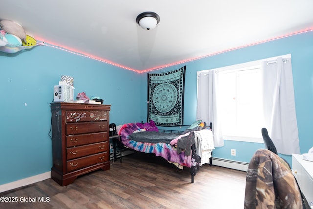 177 County Highway 155, Mayfield, NY 12025 - bedroom with baseboard heating, wood finished floors, and baseboards