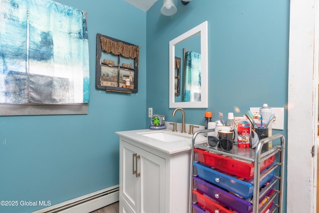 177 County Highway 155, Mayfield, NY 12025 - bathroom featuring a baseboard heating unit and vanity