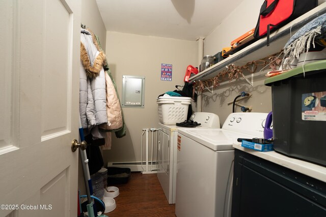 177 County Highway 155, Mayfield, NY 12025 - laundry area featuring a baseboard heating unit, washer and clothes dryer, and dark wood-style flooring