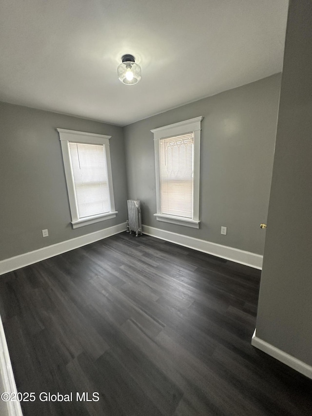 6 Alvey St, Schenectady, NY 12304 - empty room featuring radiator, plenty of natural light, and baseboards