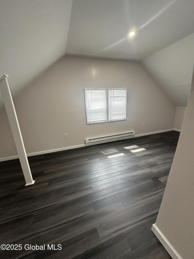 6 Alvey St, Schenectady, NY 12304 - bonus room with baseboard heating, vaulted ceiling, baseboards, and dark wood-style flooring