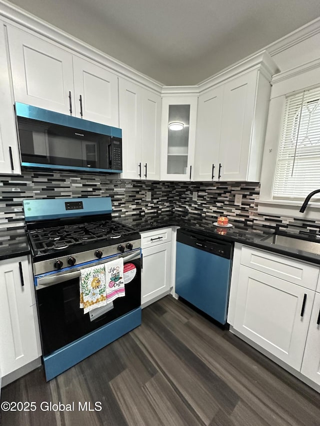 6 Alvey St, Schenectady, NY 12304 - kitchen with gas stove, dishwasher, dark wood-type flooring, and dark countertops