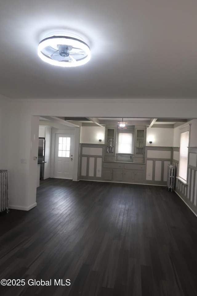 6 Alvey St, Schenectady, NY 12304 - unfurnished room with radiator heating unit and dark wood-style floors