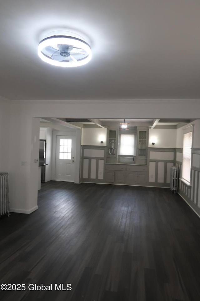 6 Alvey St, Schenectady, NY 12304 - spare room featuring radiator heating unit and dark wood-style flooring