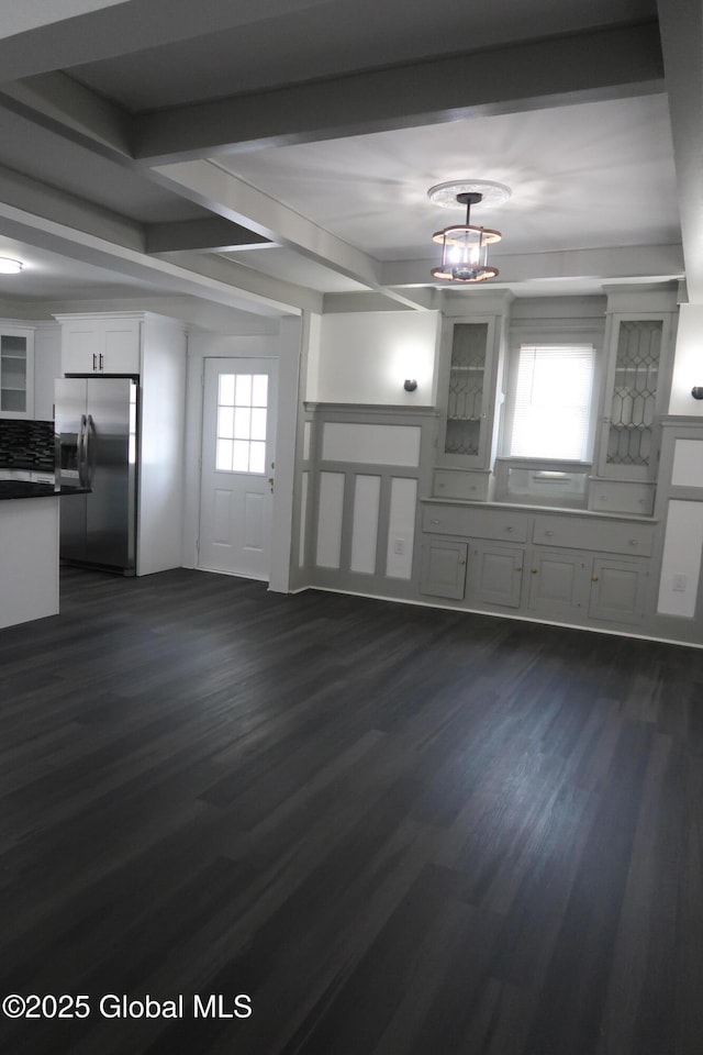 6 Alvey St, Schenectady, NY 12304 - unfurnished dining area featuring dark wood-type flooring, a chandelier, and beam ceiling