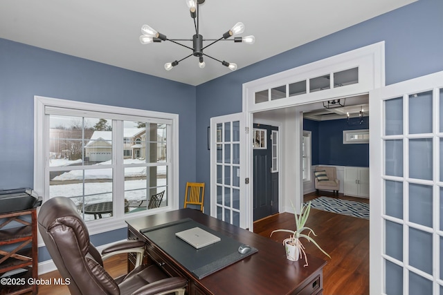 office space featuring a chandelier, wood finished floors, and french doors