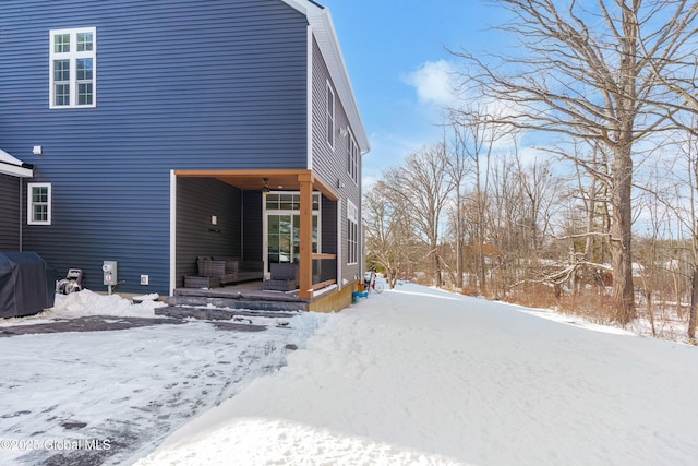 view of snow covered house