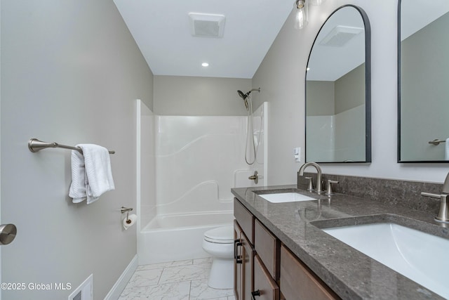 full bath with toilet, marble finish floors, baseboards, shower / bathtub combination, and double vanity