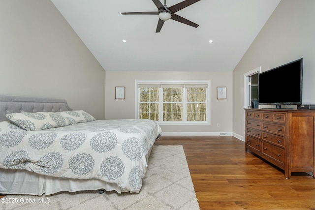 bedroom with wood finished floors, recessed lighting, baseboards, high vaulted ceiling, and a ceiling fan