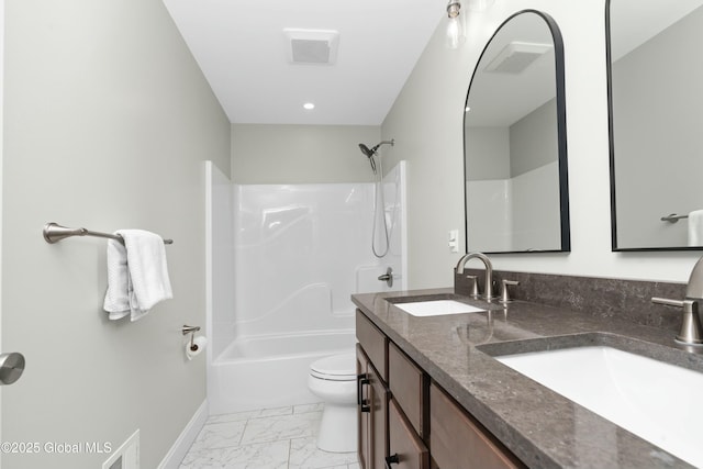 full bathroom with marble look tile flooring, toilet, baseboards, double vanity, and washtub / shower combination