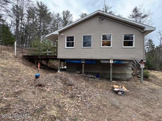 11 Beaureguard Way, Minerva, NY 12851 - view of side of property featuring a wooden deck