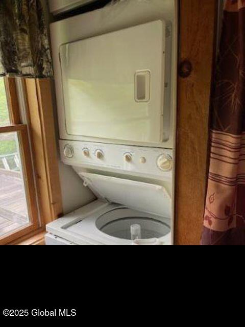 11 Beaureguard Way, Minerva, NY 12851 - laundry area with stacked washing machine and dryer