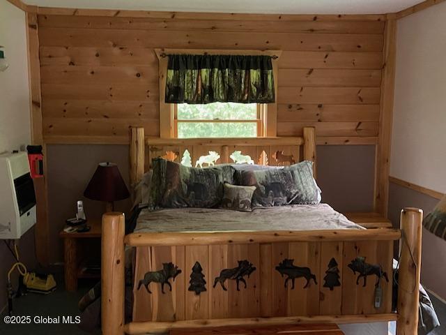 11 Beaureguard Way, Minerva, NY 12851 - bedroom featuring wood walls