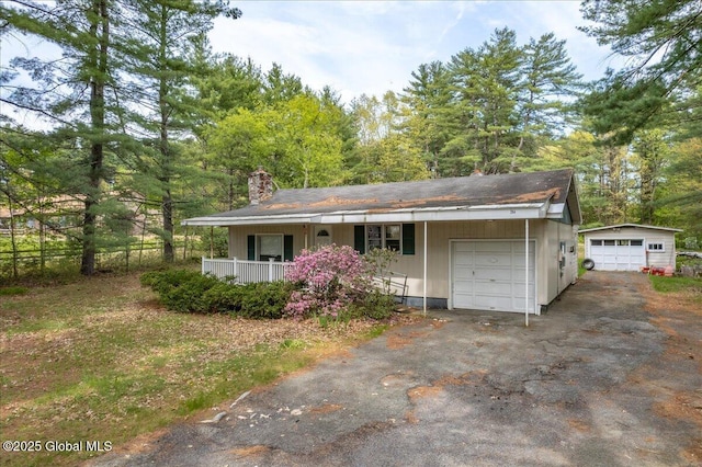 204 Greenfield Ave, Milton, NY 12020 - view of front of property with covered porch, a chimney, and a garage