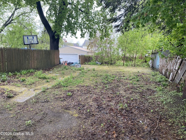 20 Henry St, Schenectady, NY 12304 - view of yard featuring fence and a garage