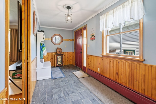 18 Main St, Berne, NY 12059 - entryway featuring a baseboard heating unit, a wainscoted wall, wood walls, and ornamental molding