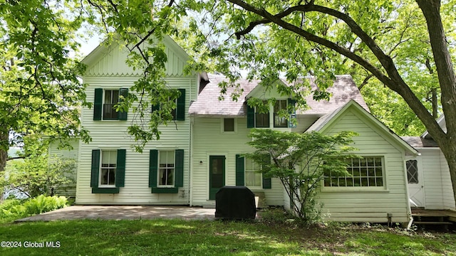 601/603 Baldwin Rd, Ticonderoga, NY 12883 - back of house with a patio