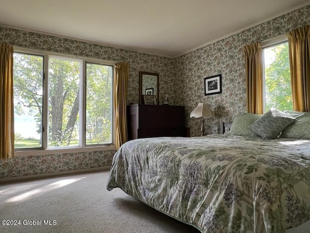 601/603 Baldwin Rd, Ticonderoga, NY 12883 - bedroom with wallpapered walls, ornamental molding, and carpet floors