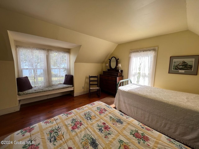 601/603 Baldwin Rd, Ticonderoga, NY 12883 - bedroom featuring lofted ceiling, wood finished floors, and baseboards