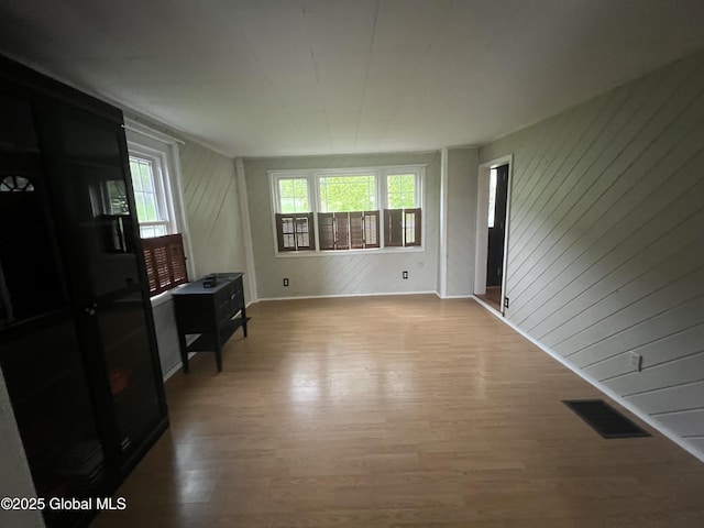 2299 Coach Rd, Argyle, NY 12809 - unfurnished living room featuring wood finished floors and baseboards