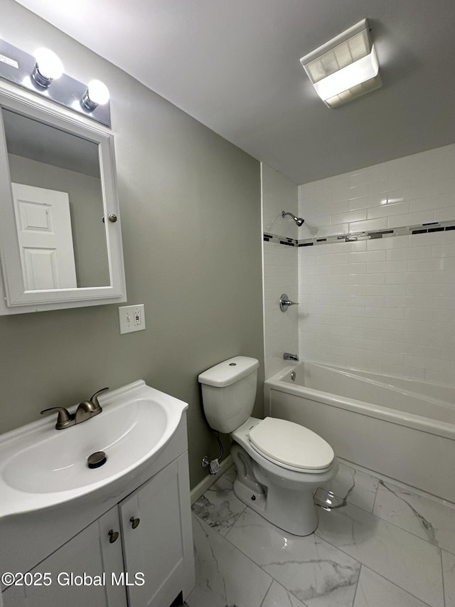 full bath featuring toilet, vanity, shower / tub combination, and marble finish flooring