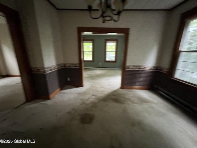 92 N Pearl St, Schaghticoke, NY 12118 - unfurnished dining area with a chandelier and carpet