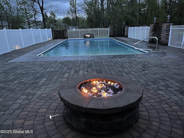 505 Elm Ave, Bethlehem, NY 12158 - view of pool featuring a fenced backyard, an outdoor fire pit, and a patio
