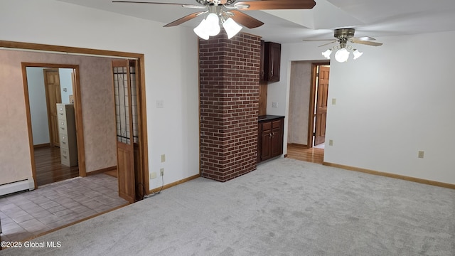 505 Elm Ave, Bethlehem, NY 12158 - empty room with a ceiling fan, light colored carpet, baseboards, and a baseboard heating unit