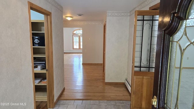 505 Elm Ave, Bethlehem, NY 12158 - hall featuring wood-type flooring, a baseboard radiator, and baseboards