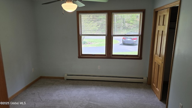 505 Elm Ave, Bethlehem, NY 12158 - empty room featuring a baseboard heating unit, carpet flooring, ceiling fan, and baseboards