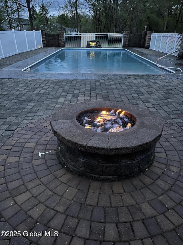 505 Elm Ave, Bethlehem, NY 12158 - view of pool with a fire pit, a fenced backyard, and a patio area
