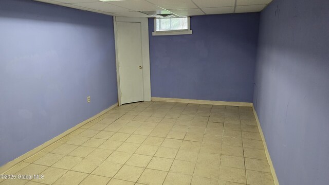 505 Elm Ave, Bethlehem, NY 12158 - basement featuring a drop ceiling and baseboards