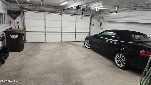 505 Elm Ave, Bethlehem, NY 12158 - garage featuring a garage door opener