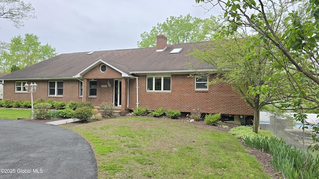 505 Elm Ave, Bethlehem, NY 12158 - single story home featuring brick siding, a front lawn, a chimney, and a shingled roof