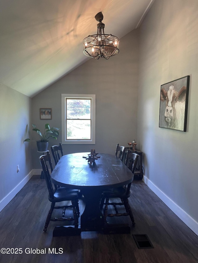 1054 Vly Smt, Cambridge, NY 12834 - dining space with lofted ceiling, dark wood-style flooring, baseboards, and a chandelier