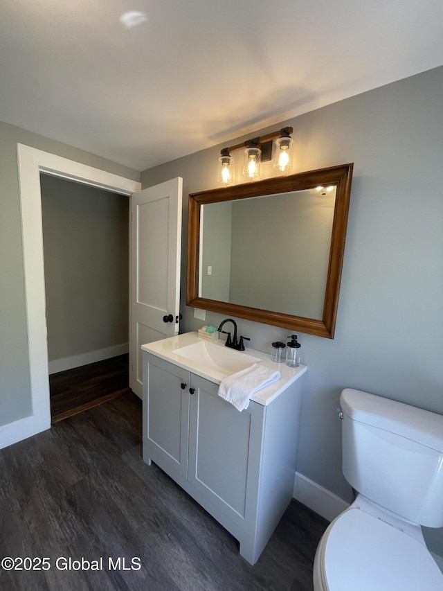 1054 Vly Smt, Cambridge, NY 12834 - bathroom with wood finished floors, baseboards, toilet, and vanity