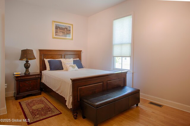 138 Church St, Saratoga Springs, Inside, NY 12866 - bedroom with light wood-type flooring and baseboards
