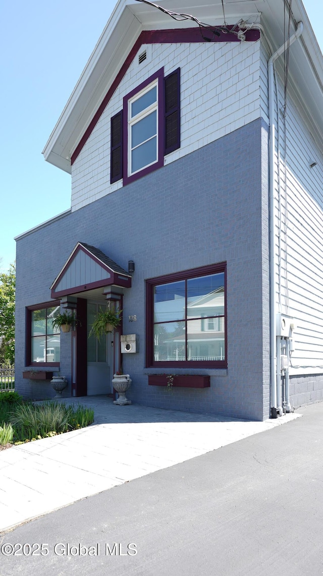 138 Church St, Saratoga Springs, Inside, NY 12866 - view of front facade featuring brick siding