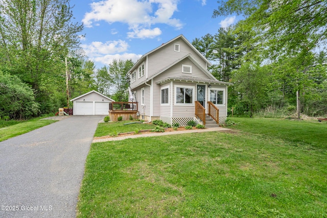 109 Wood Rd, Ballston Spa, NY 12020 - view of front of home with an outdoor structure, a garage, entry steps, and a front yard