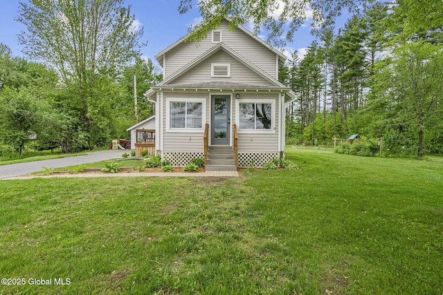 109 Wood Rd, Ballston Spa, NY 12020 - view of front of house with entry steps and a front lawn