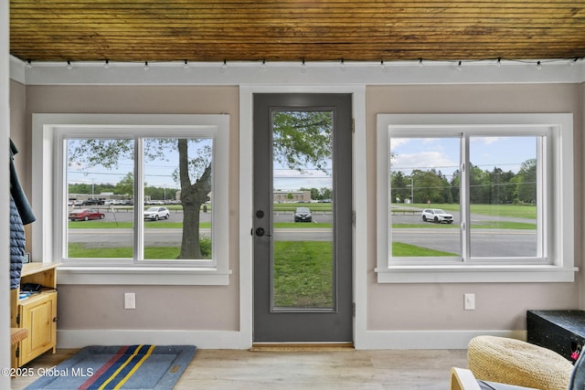 109 Wood Rd, Ballston Spa, NY 12020 - entryway featuring plenty of natural light, baseboards, rail lighting, and wood finished floors