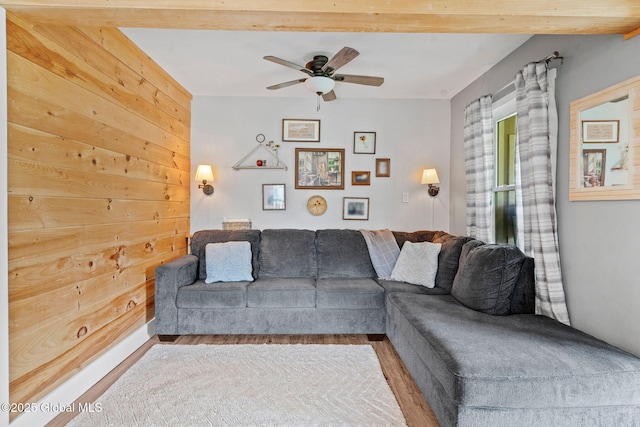 109 Wood Rd, Ballston Spa, NY 12020 - living area with ceiling fan, wood finished floors, and wooden walls