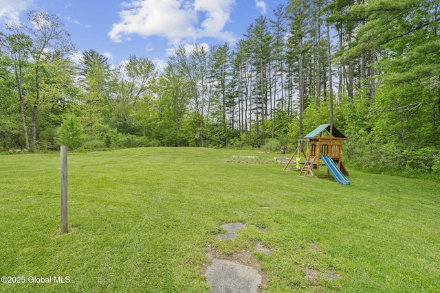 109 Wood Rd, Ballston Spa, NY 12020 - view of green lawn featuring a playground and a wooded view