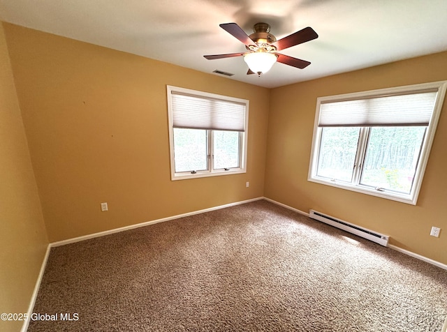 110 Juniper Hill Dr Unit 34, Bolton, NY 12814 - carpeted empty room featuring a baseboard heating unit, ceiling fan, and baseboards