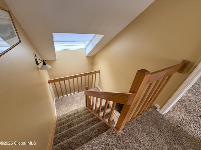 110 Juniper Hill Dr Unit 34, Bolton, NY 12814 - stairway with carpet and a skylight