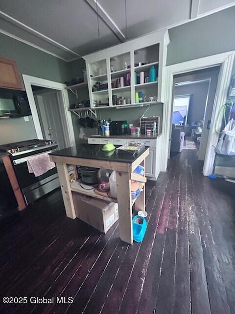 436 Lower Main St, Fort Edward, NY 12839 - kitchen with open shelves, stainless steel gas range, dark wood-type flooring, black microwave, and dark countertops